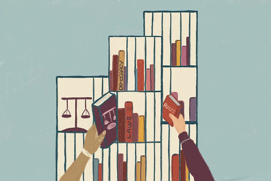 This illustration shows a scene in front of a bookshelf, in which two people are reaching out to grab books with titles such as Democracy, Laws and  Rules.
