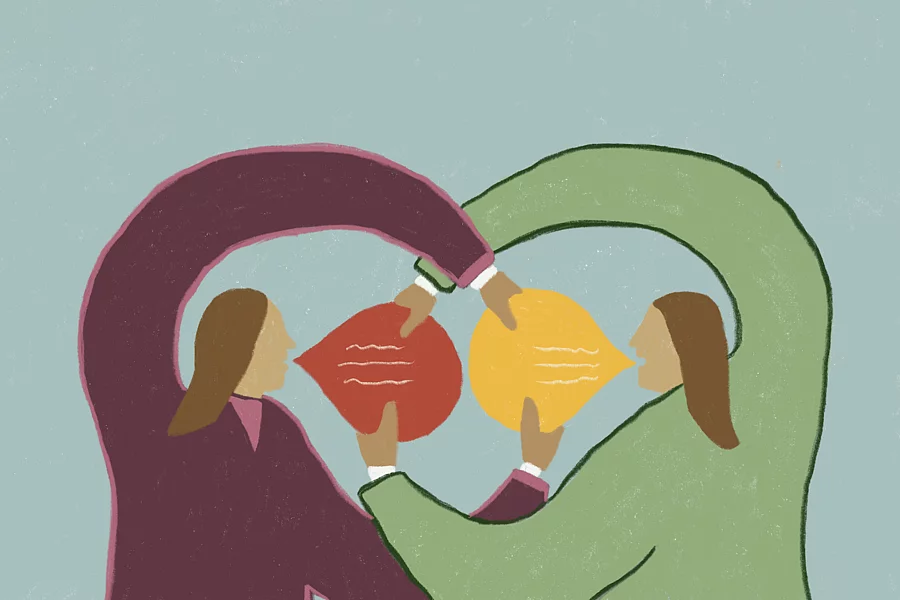 The illustration depicts communication and empathy between two people who are engaged in conversation, exchanging views and sharing their perspectives and words. The speech bubbles in their hands show the exchange of thoughts and feelings.